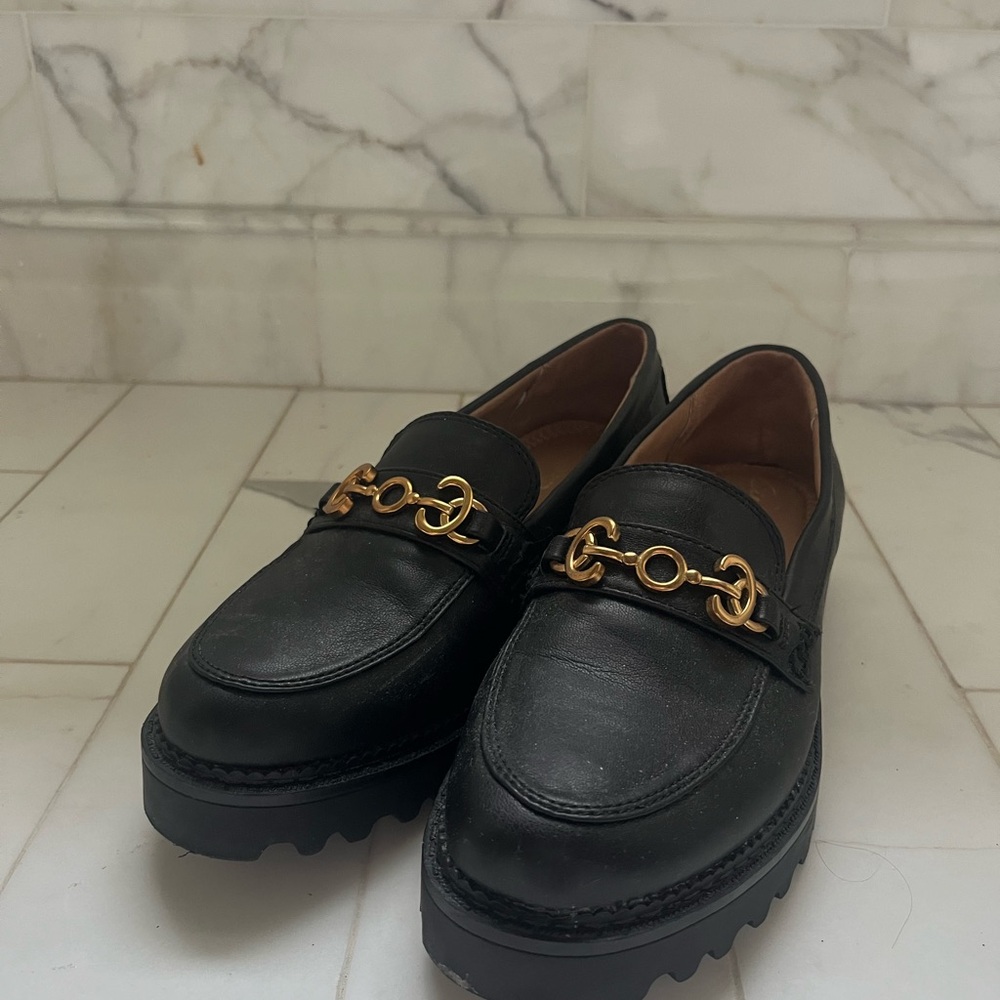 Black Leather Loafers with Gold Detailing